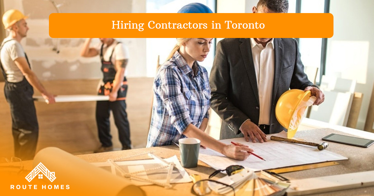 Top Reasons Why Renovating a Home in Toronto Is a Smart Investment 4 Contractors and a homeowner reviewing renovation plans